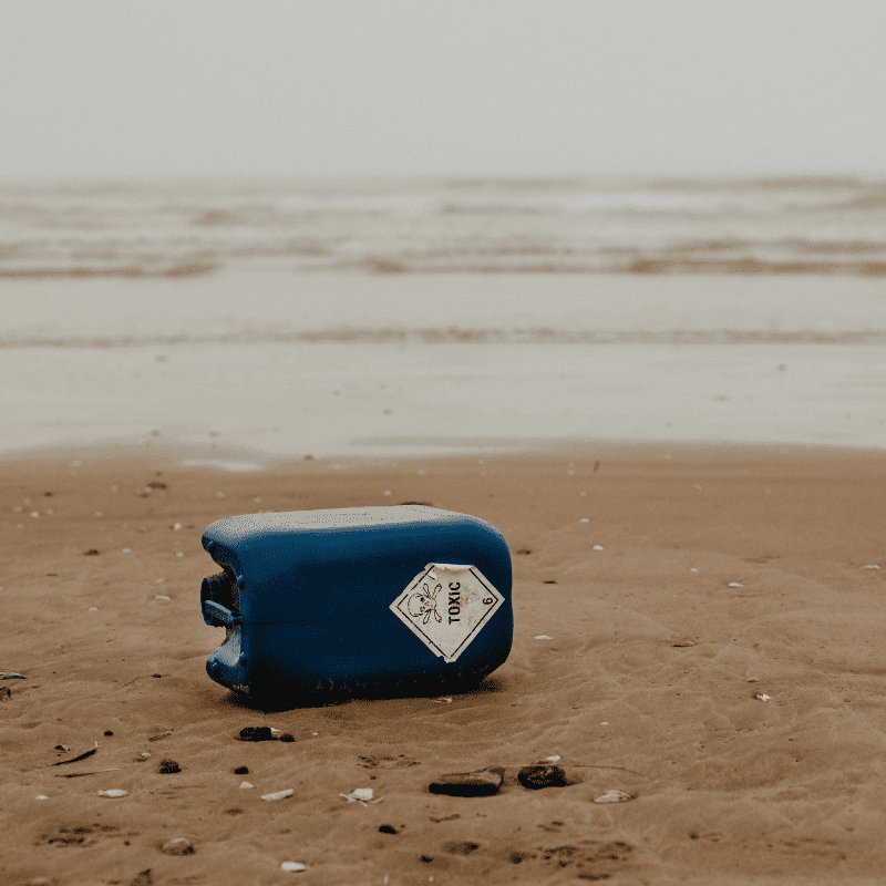 A plastic water jug on the seashore