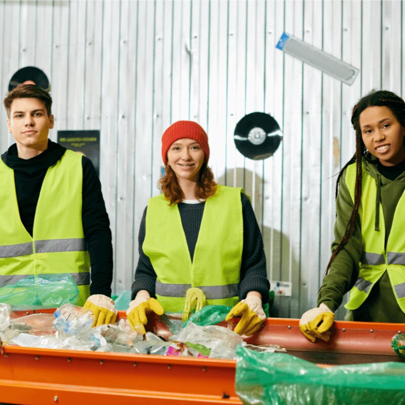 Group of employees recycling